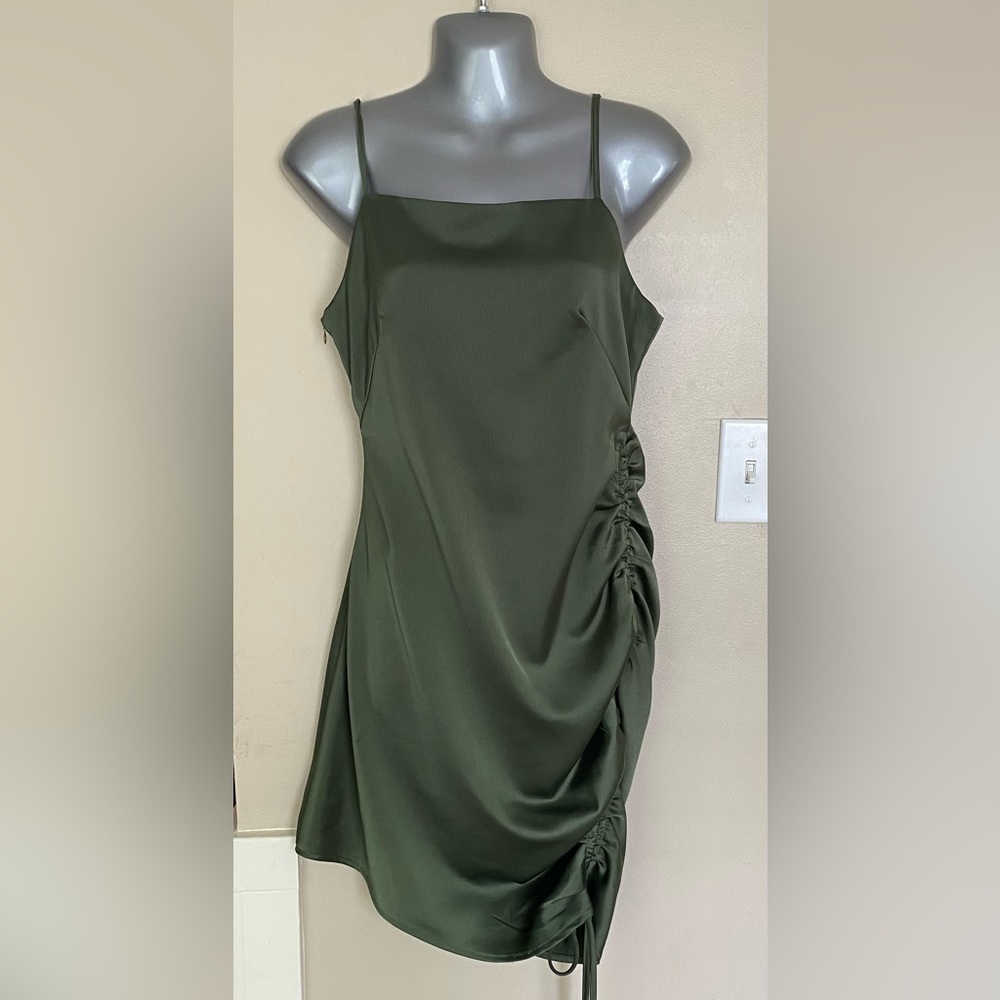 BOUTIQUE SIZE S DARK MINI GREEN DRESS